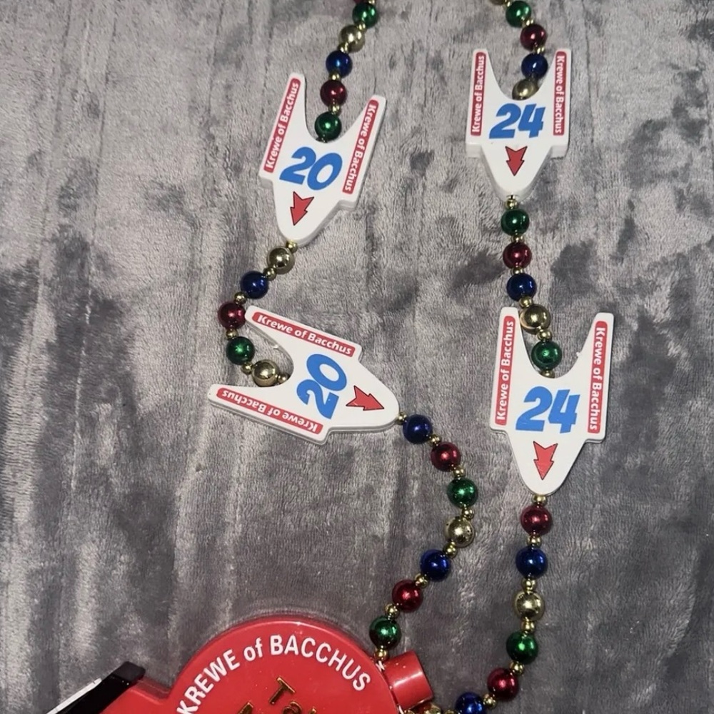 2024 Krewe of Bacchus light up medallion Mardi Gras bead “Take a Number Please”
